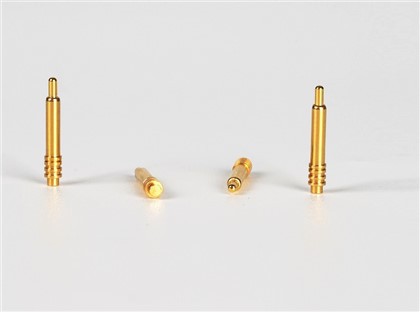 Spille Pogo in oro placcato caricato a molla